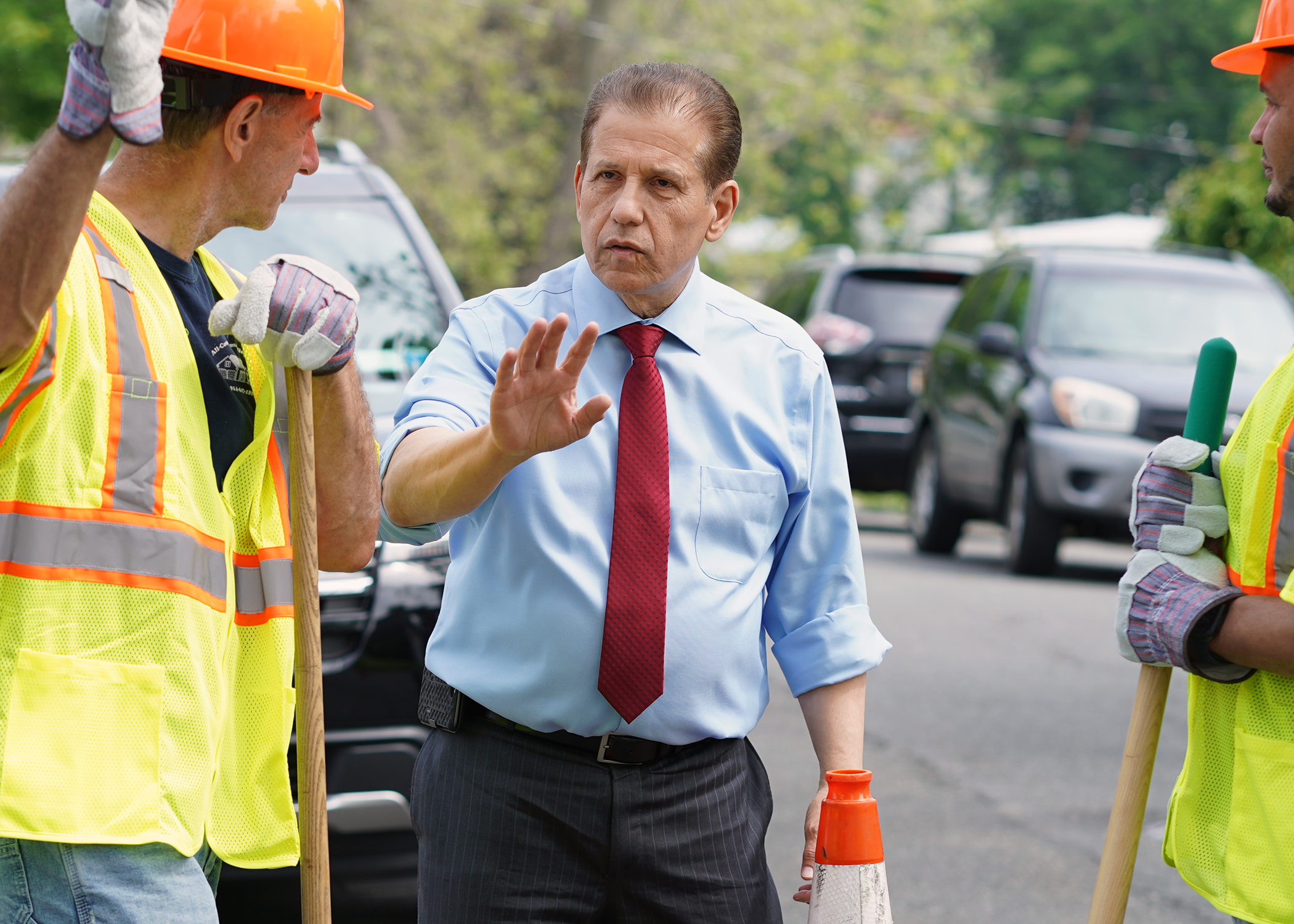 Discussing infrastructure needs with local road workers